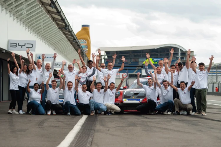QA Systems team celebrating its 30th anniversary at the Hockenheimring.